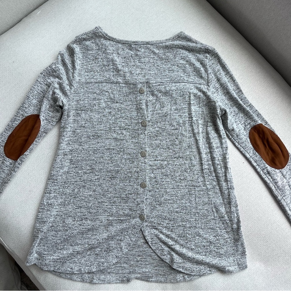 Pink Clover back button with elbow detail.